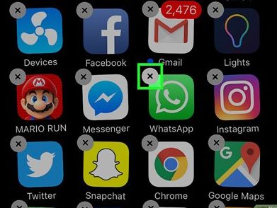 Tahan ikon WhatsApp hingga muncul tanda x